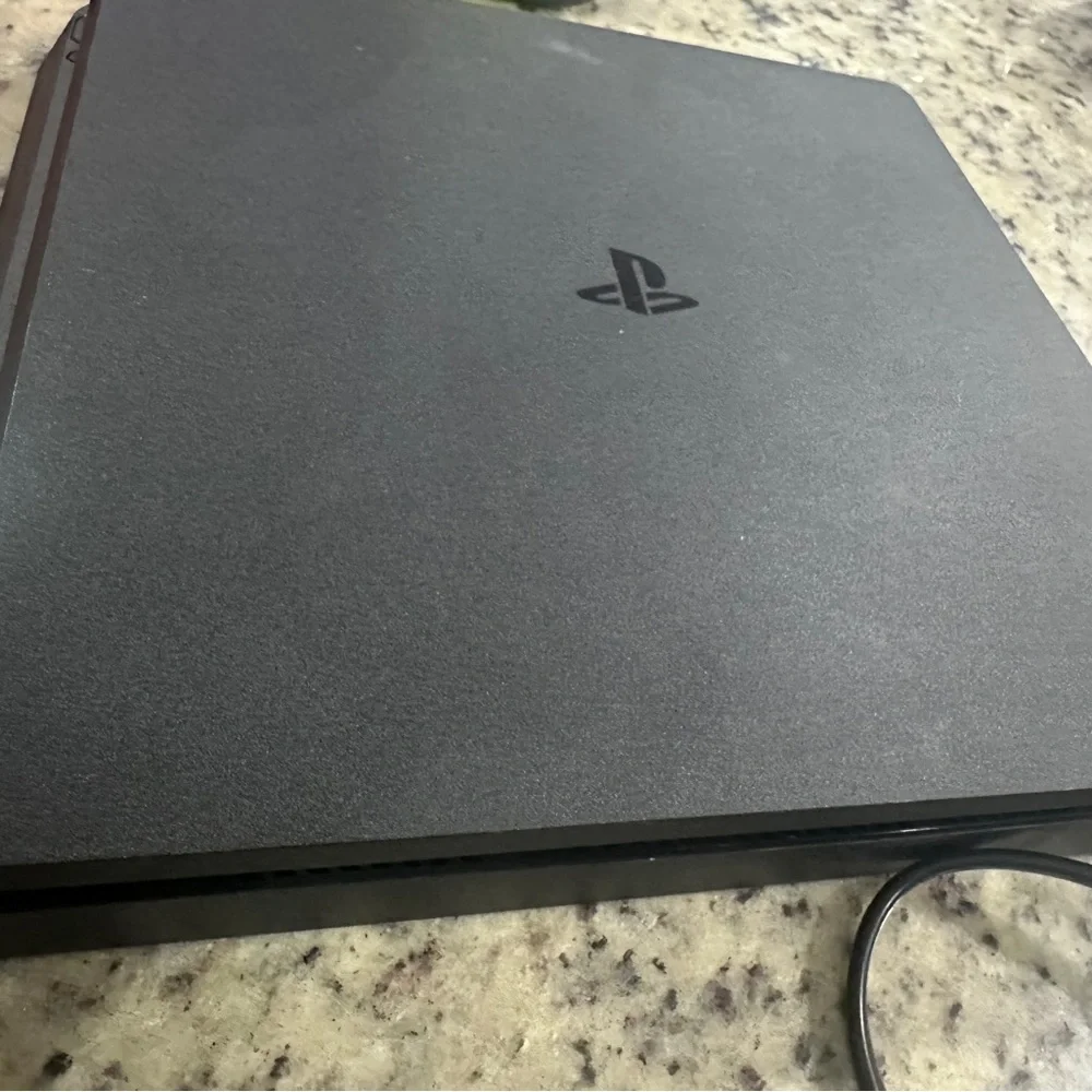 Sony Black Console with Dual Controllers